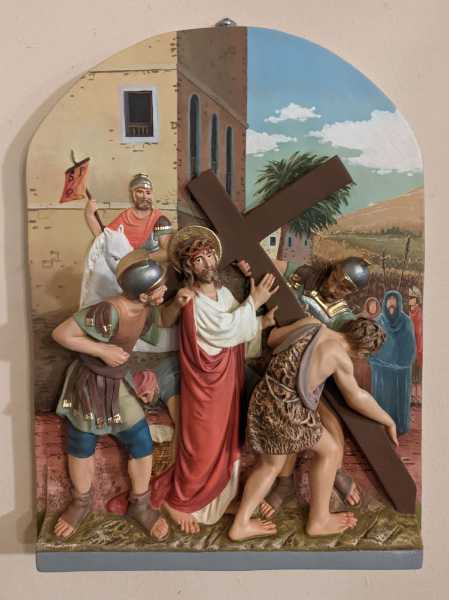 2-JESUS-IS-MADE-TO-BEAR-HIS-CROSS